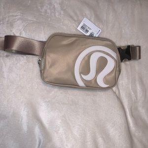 Everywhere belt bag! Leather lulu lemon logo on front.